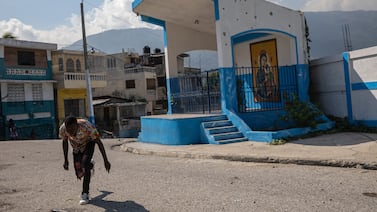 Dozens killed in Haiti's capital as armed men break away from gang coalition in bid for power