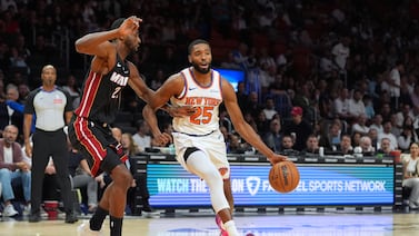 Powell scores 29 as Heat beat Knicks 115-107 in Miami’s home opener