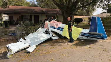 2 killed when small plane crashes in front yard of Florida home