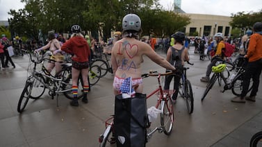 Naked bike riders demonstrate against federal troops in 'quintessentially Portland' protest