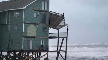 Dozens rescued as remnants of typhoon hits Alaska while nor'easter brings flooding to East Coast