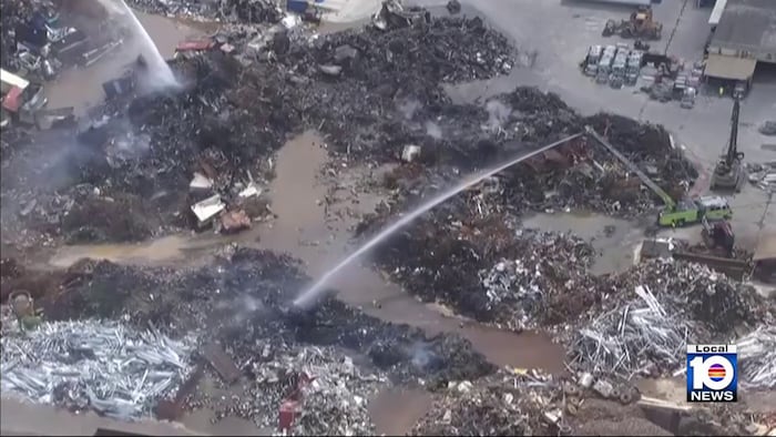 ‘It looks like a bomb’: Firefighters continue to battle large blaze at Opa-locka junkyard