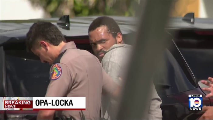FHP troopers take man in handcuffs after pursuit in Miami-Dade