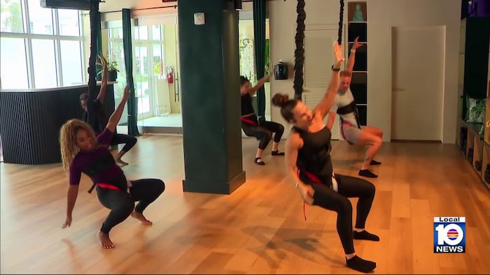 Miami Beach studio combines bungee cords, aerial silks for unique fitness workout