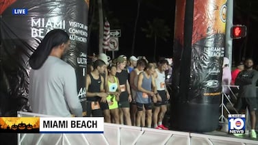 Early morning runners have Halloween fun in Miami Beach